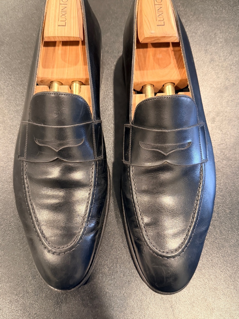 Black Leather Penny Loafers –